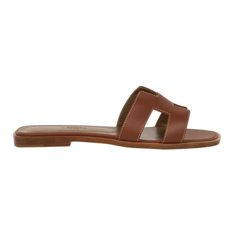 Untitled-design-2025-02-25T005753.551.png Hermes Sandal Flat Oran Gold Box Calfskin | Mightychic - Image 1